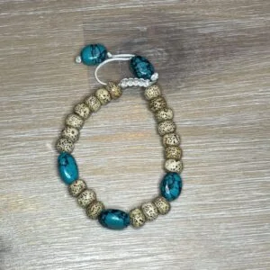 Armbandje lotusbloempitten en turquoise kralen 14cm